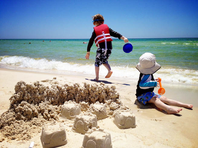 Playing along the beach is great family adventure.